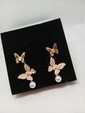 Aretes Mariposa Acero Dorado con Perla