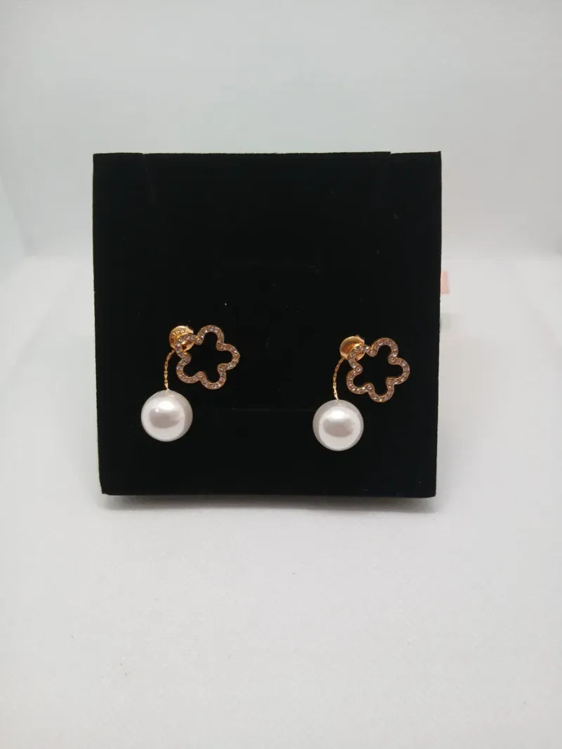 Aretes Flor Perla y Pedrería Acero Dorado