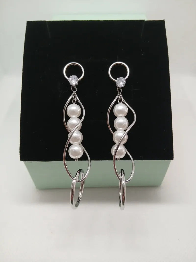 Pendientes Largos Perlas y Brillante Acero