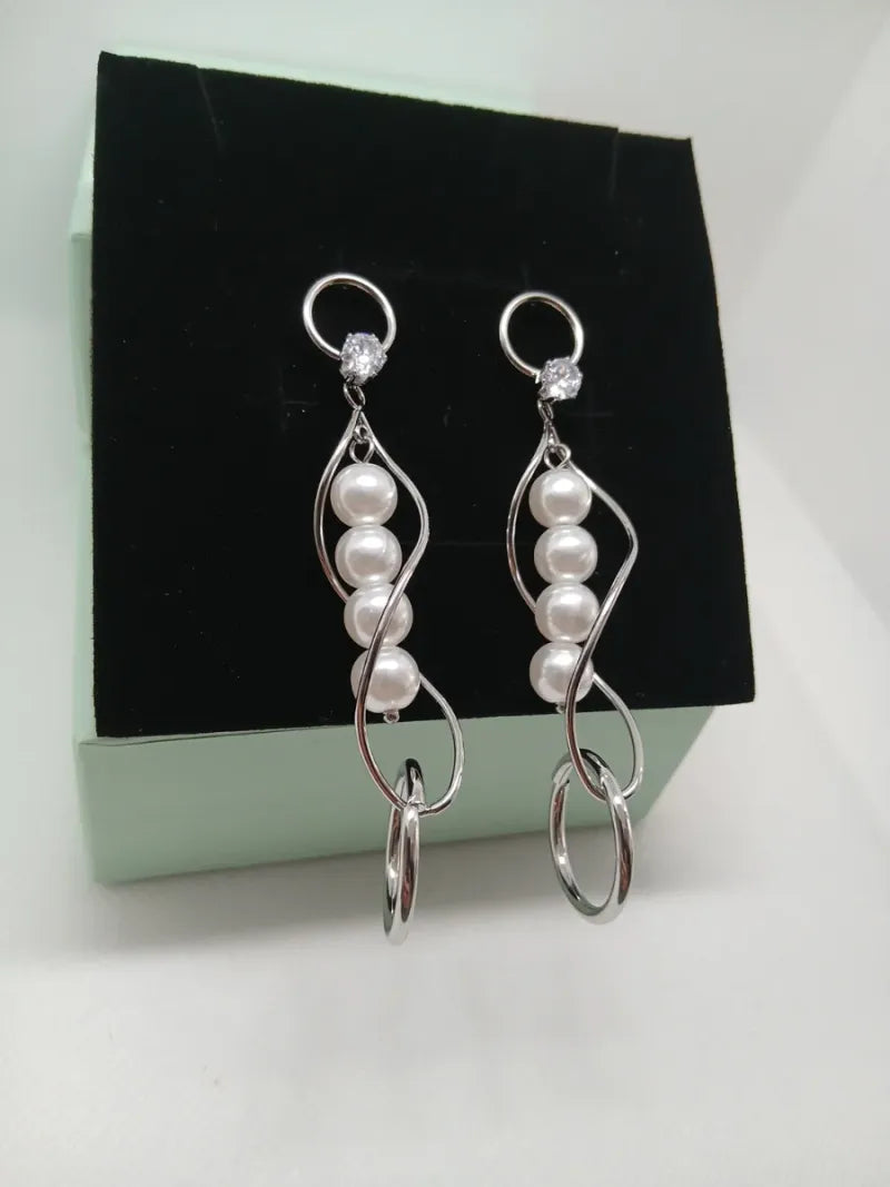 Pendientes Largos Perlas y Brillante Acero