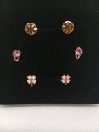 Trío de aretes pequeños acero dorado y rosa