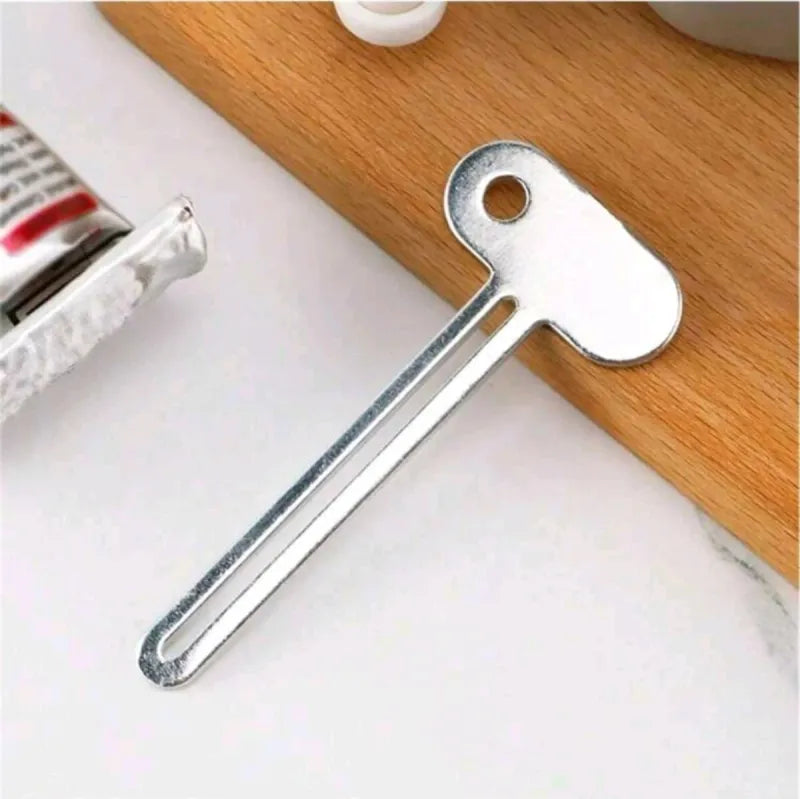 Exprimidor pasta dientes manual plata