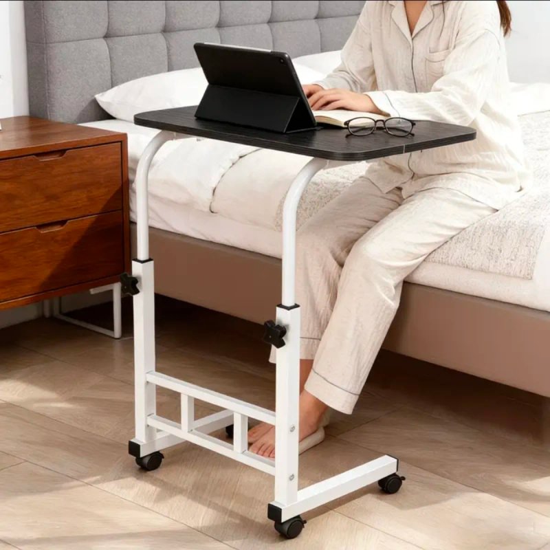 Mesa móvil con ruedas ajustable
