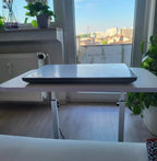Mesa móvil con ruedas ajustable